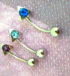 Body piercing wholesale supplier. Spike eyebrow rings with colored cz gems attached to sterling silver curved barbell