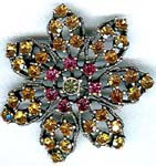 Best wholesale jewelry supply store. Cz crystal fashion brooch in star flower design with pink and amber colored gems