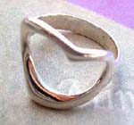 Silver jewelry wholesale supply company distributes Abstract circular cut-out fashion ring in sterling silver