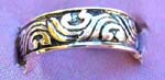 Womens jewelry accessory online wholesale boutique. Sterling silver ring with decorative wind design on band