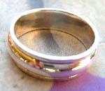 Buy wholesale bridal silver jewelry. Sterling silver wedding band with beautiful indented center 